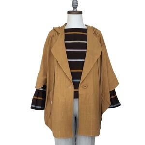 7115 by Szeki hooded poncho, size small